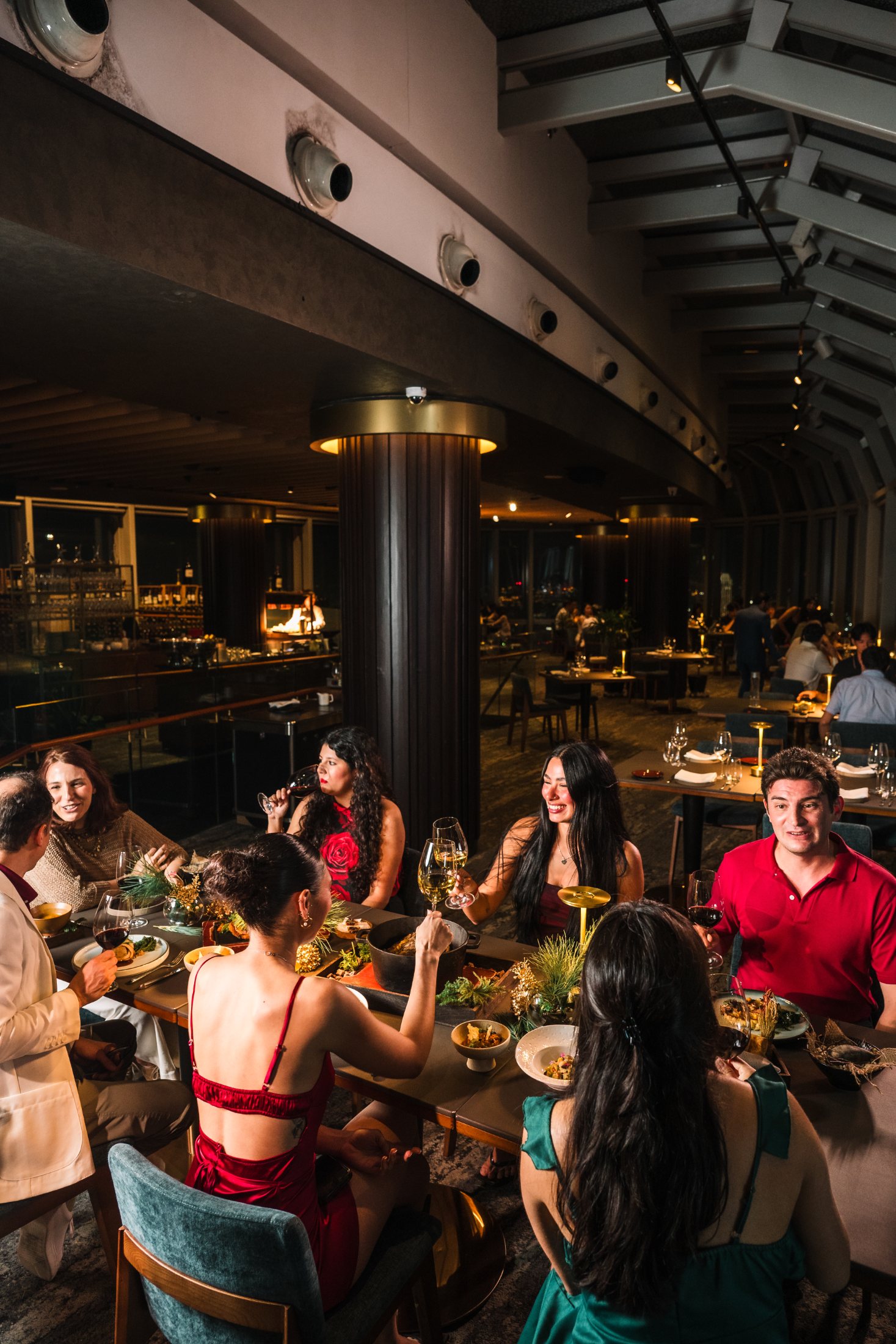 Guests celebrating New Year's Eve in the FIRE dining room